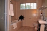 The bathroom in our Family Cottage.  Spacious with both a shower and a bath.